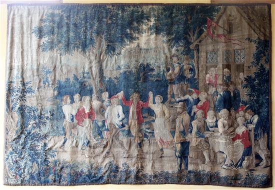 An early 18th century Flemish Teniers tapestry, from the workshop of Guillaume Werniers, H.8ft 10in. x W.13ft, extensive minor repair